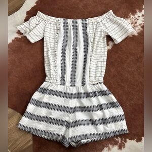 The Impeccable Pig size s off shoulder white and black short romper